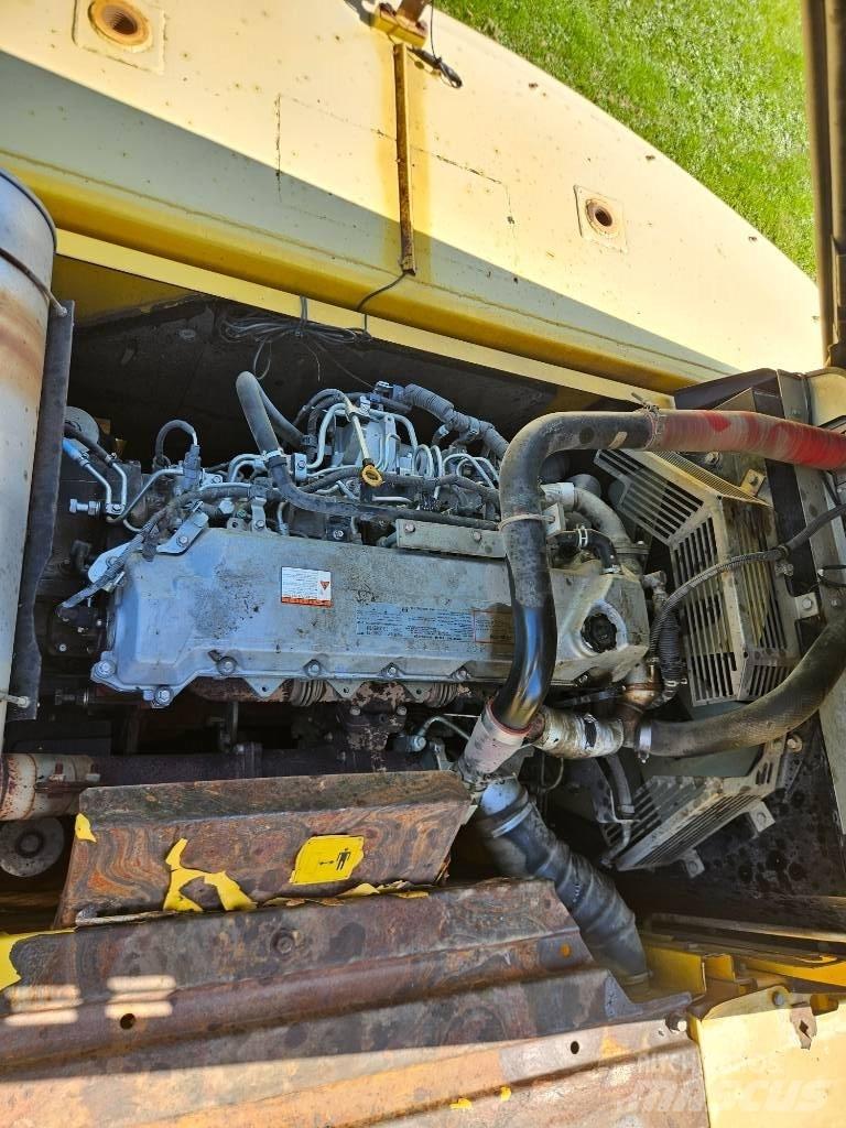 New Holland E 385 B Bageri gusjeničari