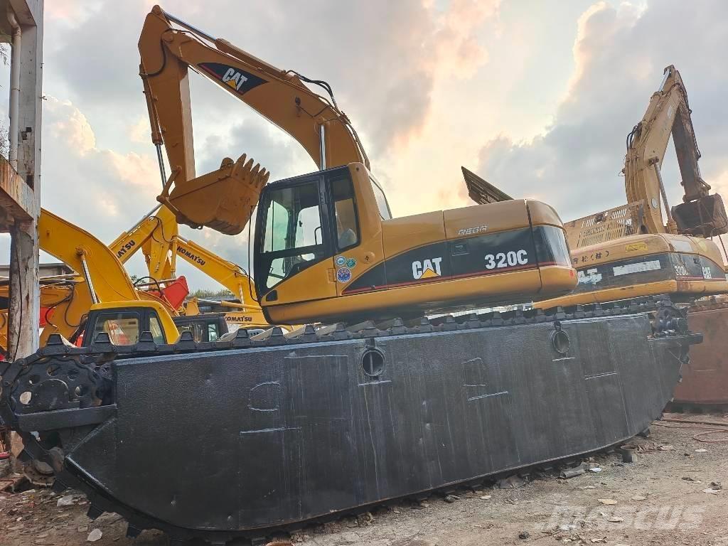 CAT 320 C Amfibijski bageri