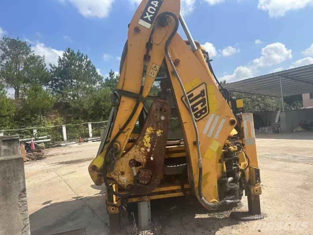 JCB 4 CX Bageri gusjeničari