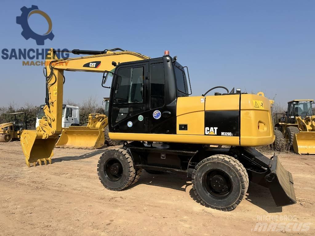 CAT M 320 D Bageri na kotačima