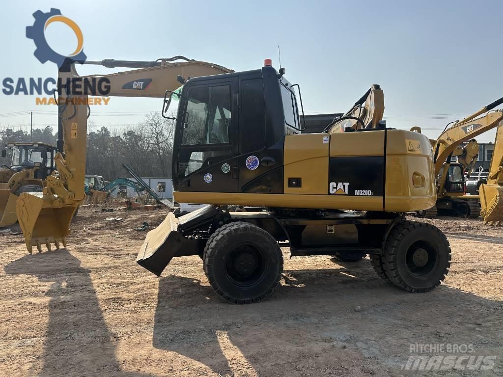 CAT M 320 D Bageri na kotačima