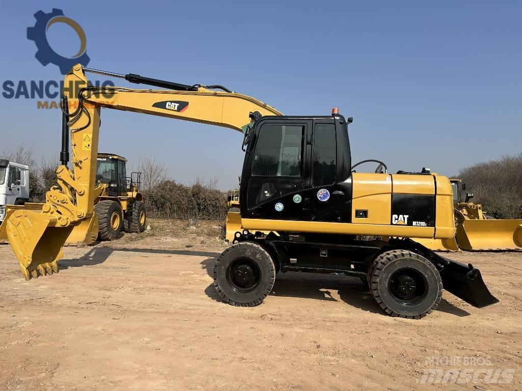 CAT M 320 D2 Bageri na kotačima