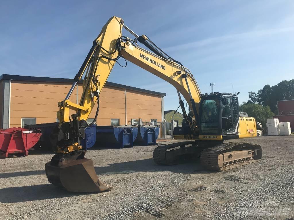 New Holland E 215 C Bageri gusjeničari
