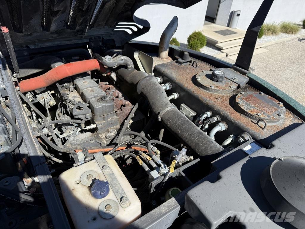 New Holland MH-Plus Bageri na kotačima