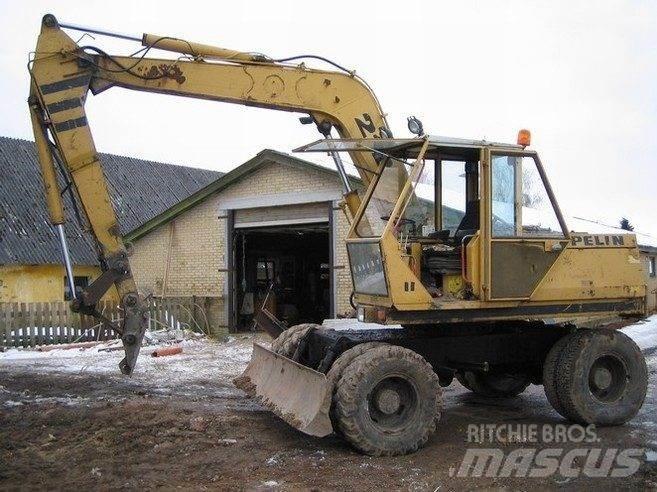 CAT 212 til ophug Bageri gusjeničari