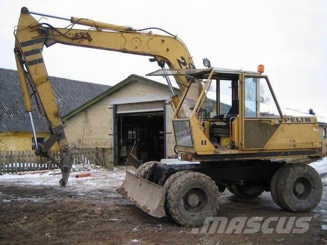 CAT 212 til ophug Bageri gusjeničari