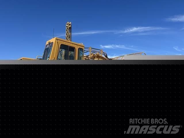 CAT 633E Strugači