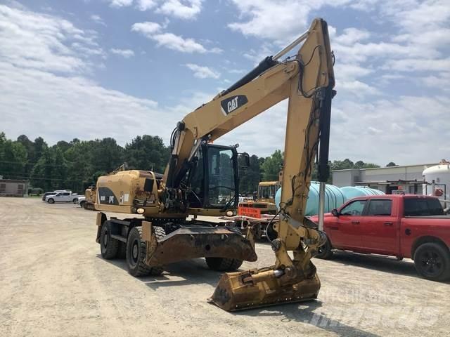CAT M318D Bageri na kotačima