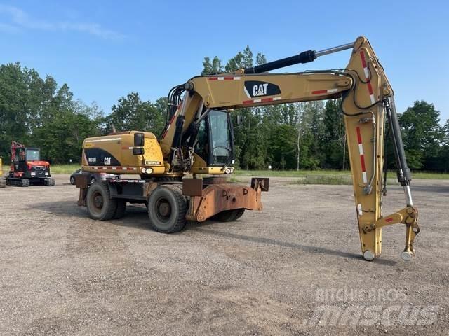 CAT M318D Bageri na kotačima