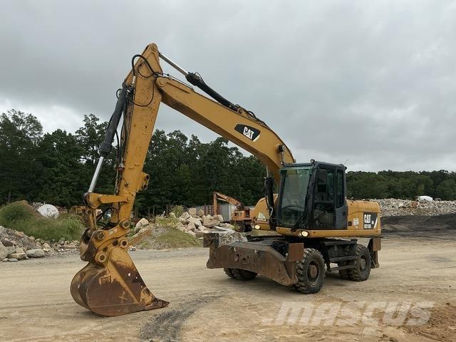 CAT M318D Bageri na kotačima