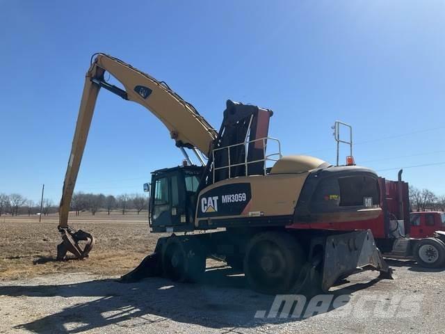 CAT MH3059 Bageri za manipuliranje materijalom / otpadom