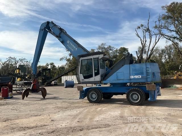 Fuchs MHL340 Bageri za manipuliranje materijalom / otpadom