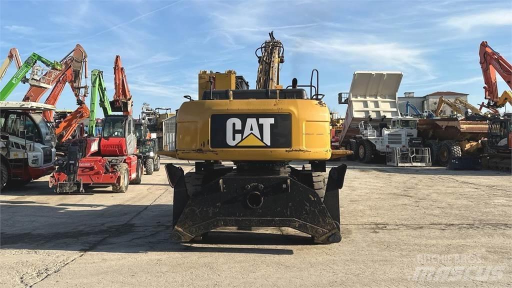 CAT M325D 4X4 Bageri na kotačima