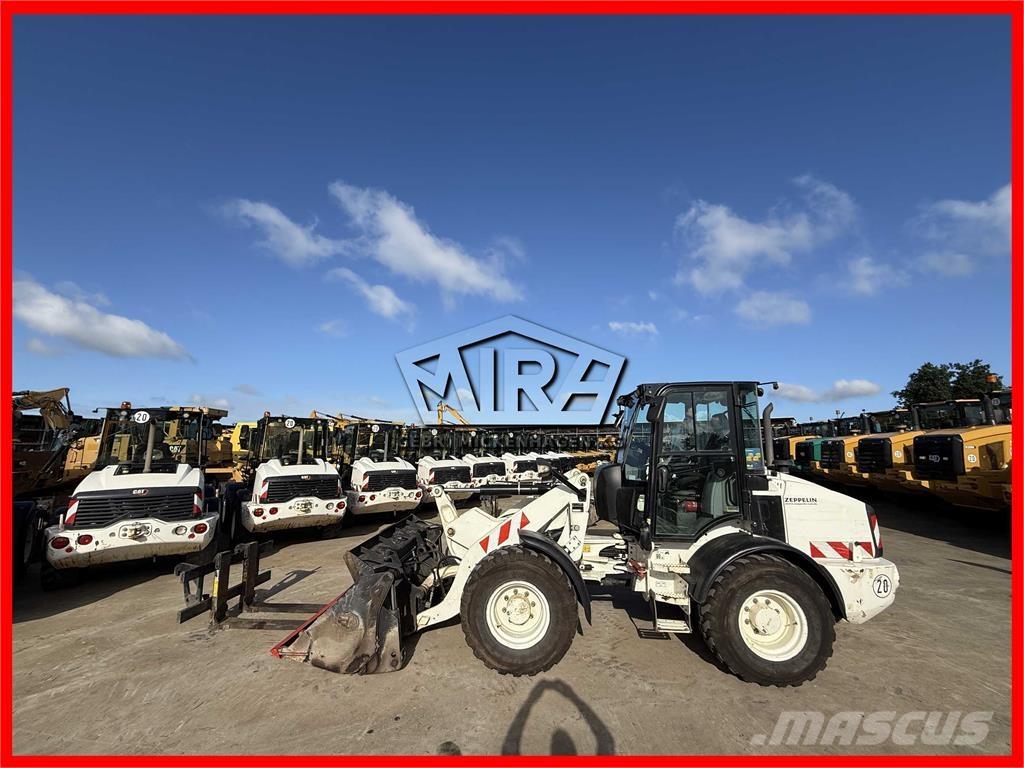 CAT 908M Utovarivači na kotačima