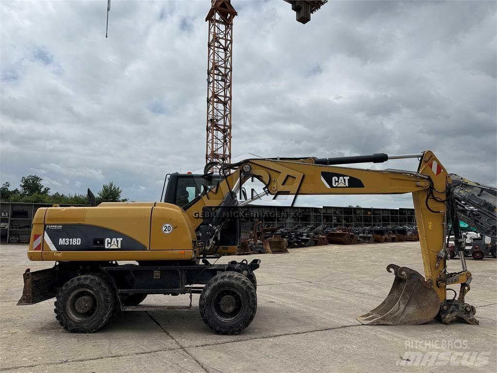 CAT M 318 D Bageri na kotačima