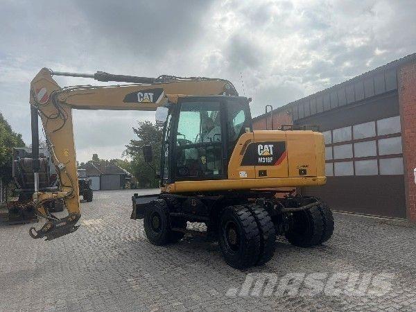 CAT M318F Bageri na kotačima