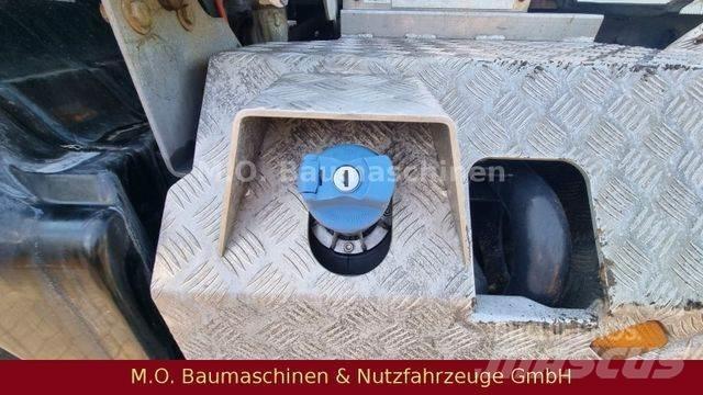 MAN TGS 35.460 Rol kiper kamioni s kukama za dizanje