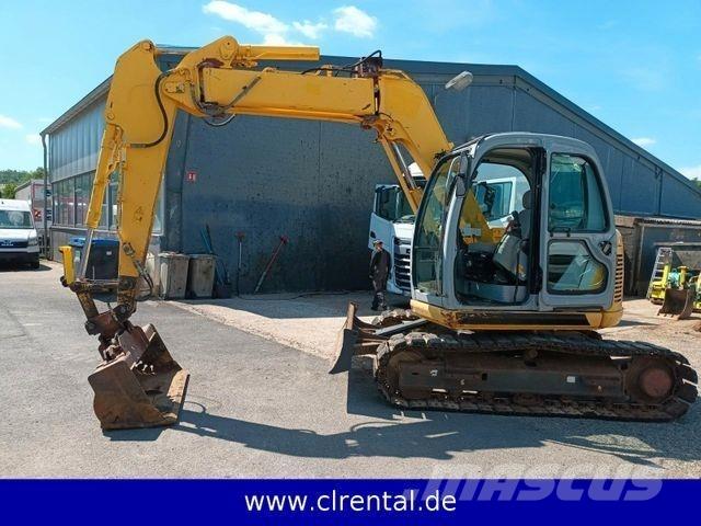 New Holland E70SR 4 Utovarni rovokopači