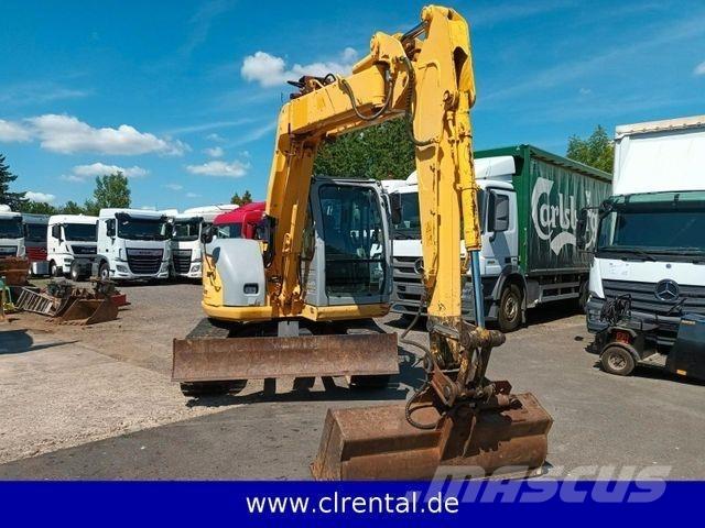 New Holland E70SR 4 Utovarni rovokopači