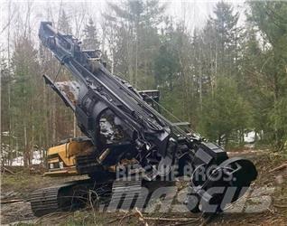 CAT 320L Strojevi za kleščenje grane drveća