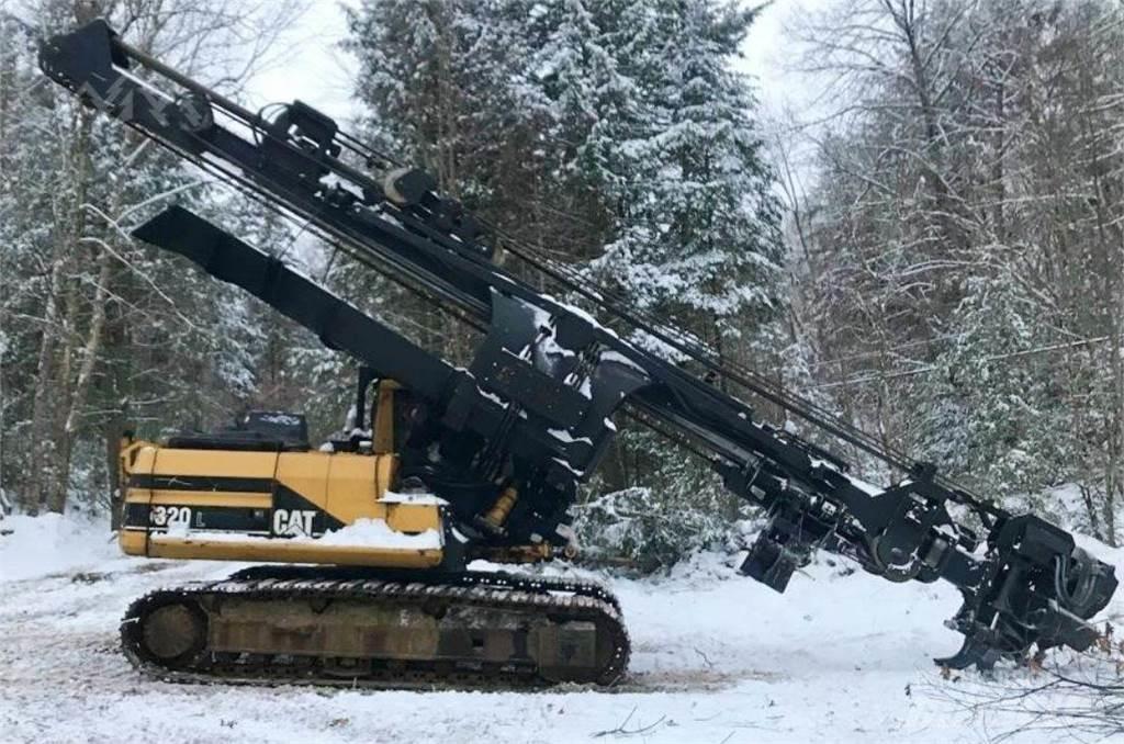 CAT 320L Strojevi za kleščenje grane drveća