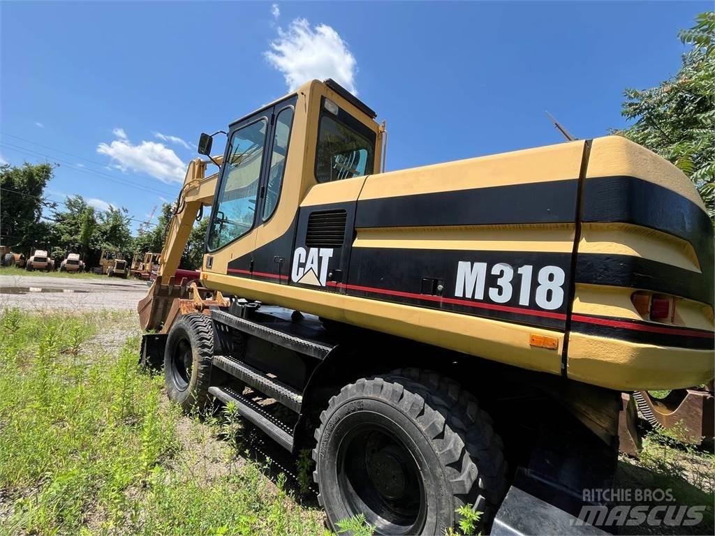 CAT M318 Bageri na kotačima