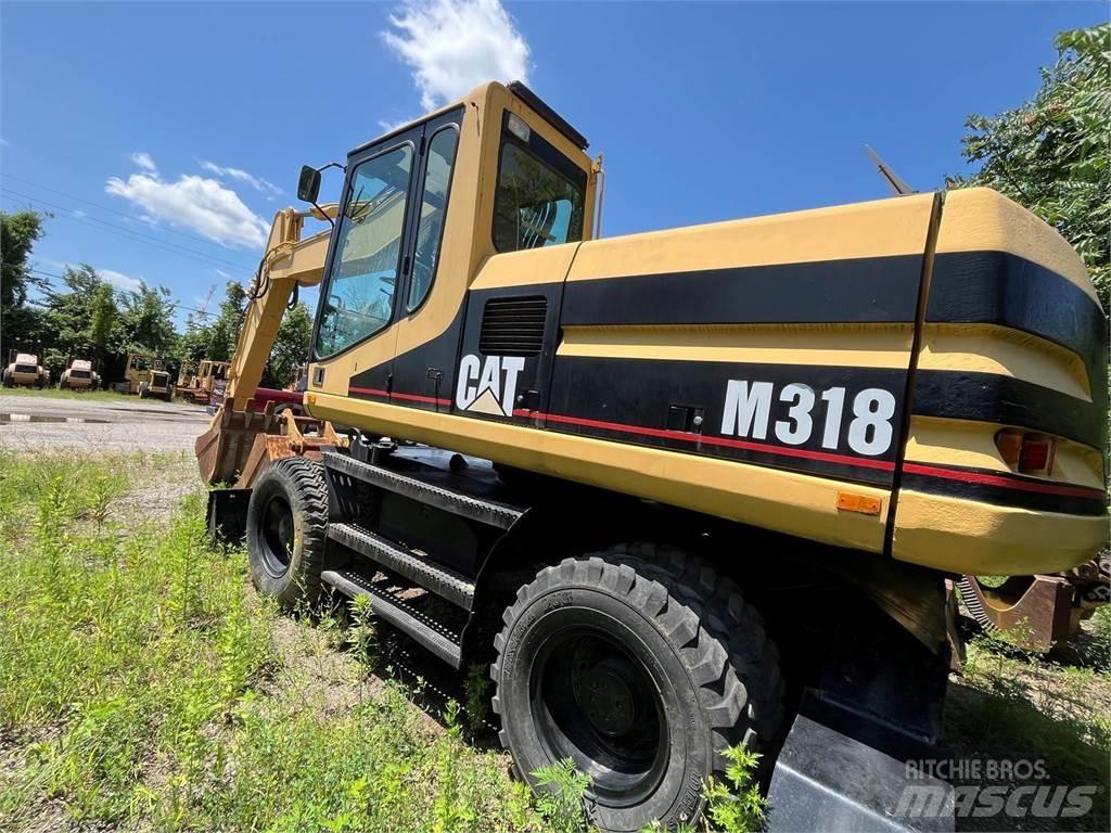 CAT M318 Bageri na kotačima