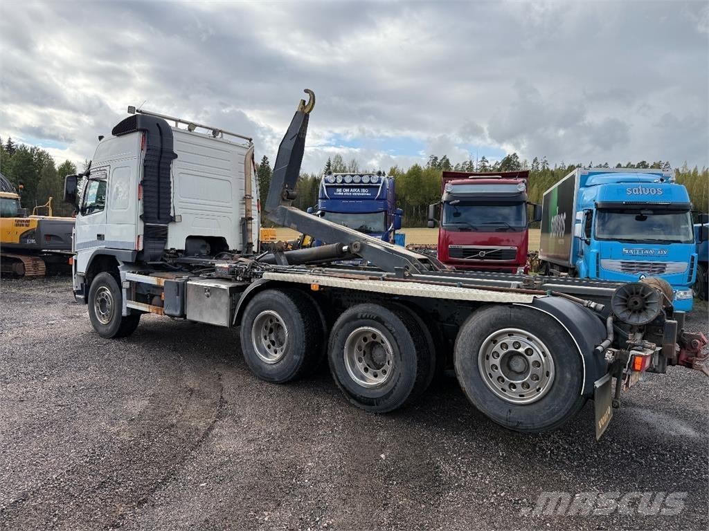 Volvo FM 12 8x4 Rol kiper kamioni s kukama za dizanje