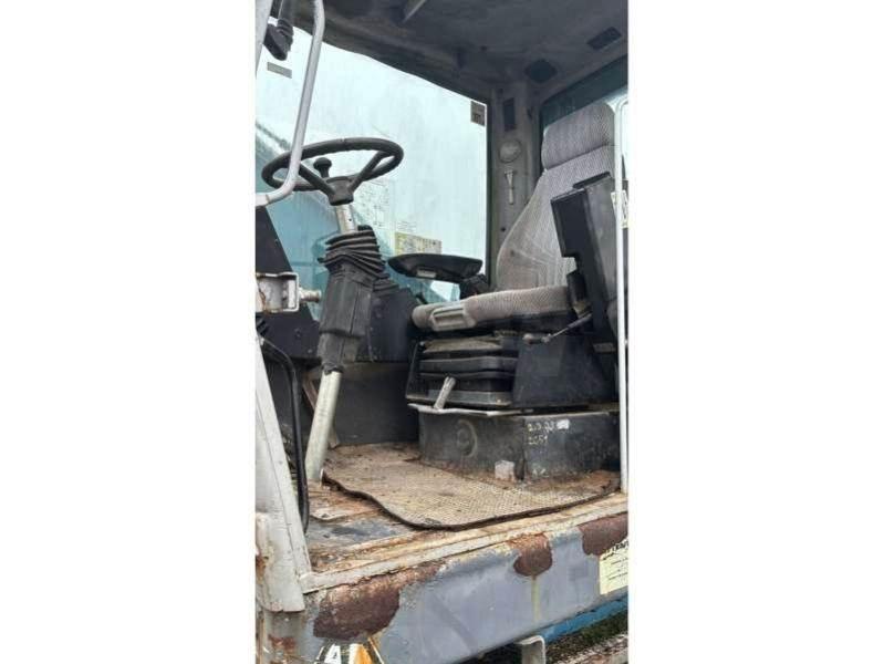 Fuchs MHL320 Bageri za manipuliranje materijalom / otpadom