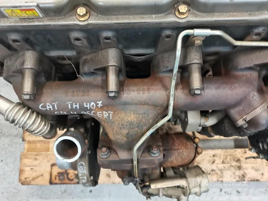 CAT TH 337 exhaust manifold  CAT C4.4 Accert} Motori