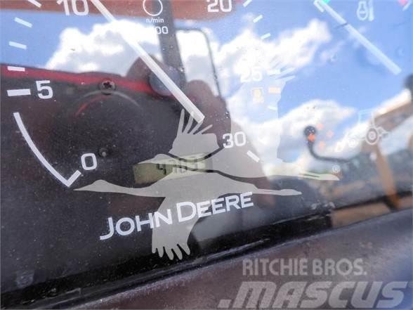 John Deere 110 Utovarni rovokopači